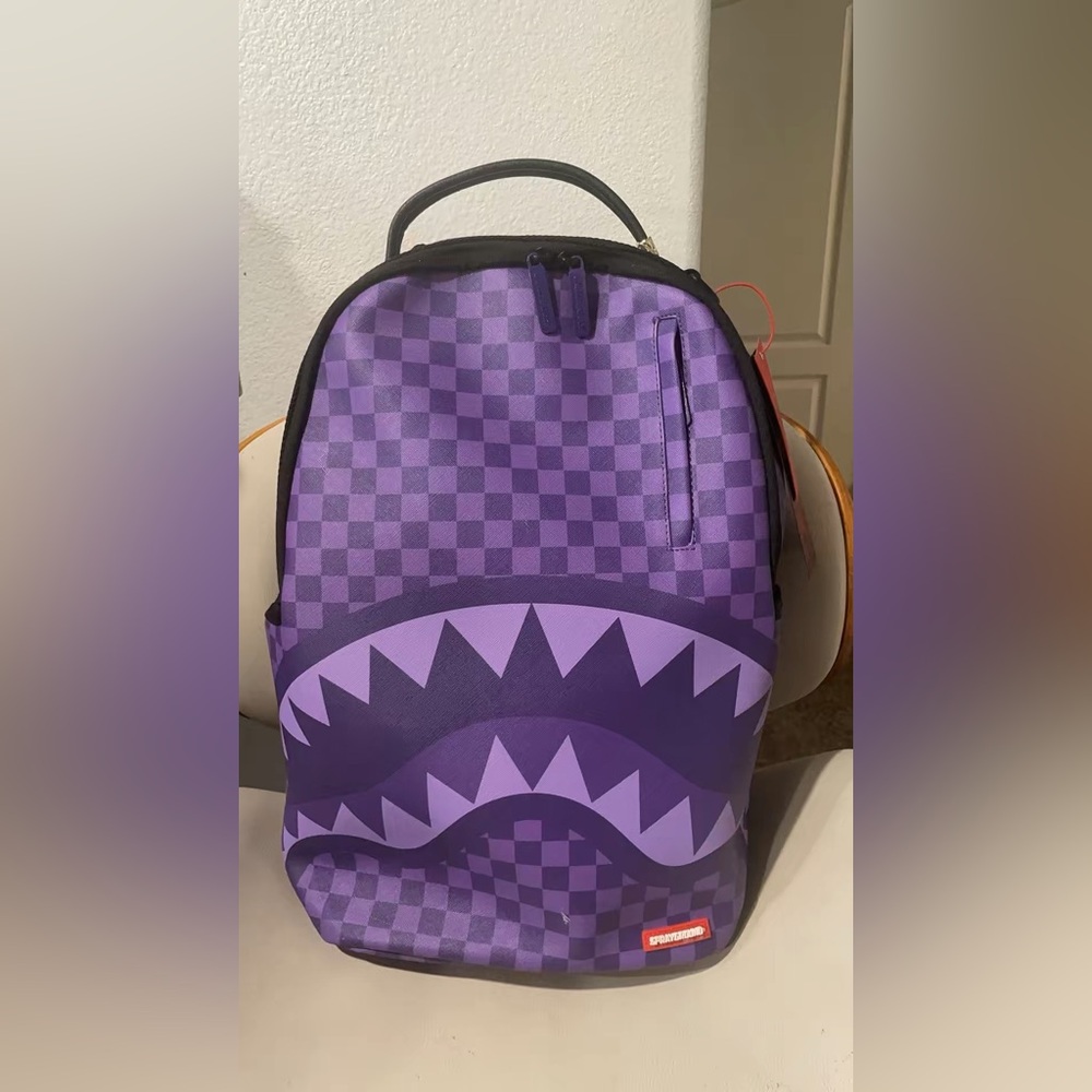 Sprayground Purple Checkered Backpack.